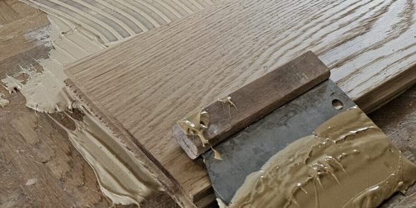 NOS SERVICES de Parqueterie et Revêtements de Sol - parquet massif collée à la spatule