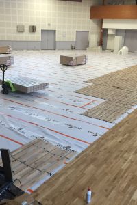 pose du Sol en parquet d'une salle des fêtes ou de réception